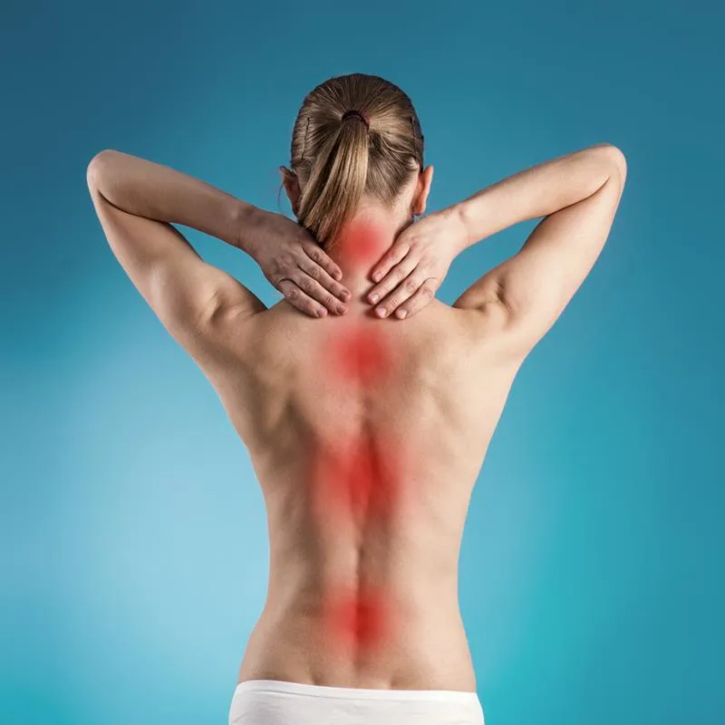 Woman experiencing back discomfort